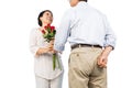 Older asian couple with roses Royalty Free Stock Photo