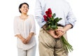 Older asian couple with roses Royalty Free Stock Photo