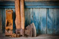 Older axes, plane and chips on a blue wooden background, with space for text Royalty Free Stock Photo