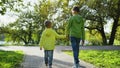 Brotherly Bond in a Park Stroll