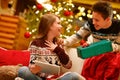 Older brother surprise with Christmas gift his little sister