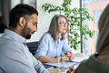 Older business woman leader talking at executive team meeting in board room. Royalty Free Stock Photo