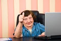 Older corporate woman giving thumbs Royalty Free Stock Photo