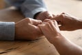 Older couple holding hands close up view Royalty Free Stock Photo