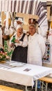 Older couple presenting traditional meals and customs on a Samobor towns day celebration