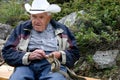 Older gentleman feeding chipmunk Royalty Free Stock Photo