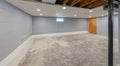 unfinished basement has had water damage repaired and has been professionally waterproofed Royalty Free Stock Photo