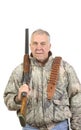 Older hunter in camo with shotgun