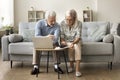 Older husband and wife checking domestic bills for payment together Royalty Free Stock Photo