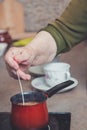 Older lady making coffee