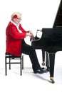 Older lady in red playing the grand piano Royalty Free Stock Photo