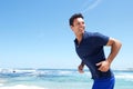 Older male fashion model enjoying the beach