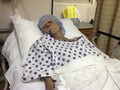 Older male hospital patient awaiting surgery