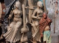 Older man and artictic sculptures at historical artistic area in Kolkata