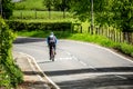 An older man cycling during the lockdown caused by coronavirus, outdoor exercises, Scotland, UK Royalty Free Stock Photo