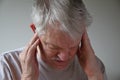 Senior man with dizziness and head pain