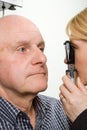 Older man having eye examination Royalty Free Stock Photo