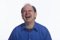 Older man laughing hysterically, horizontal Royalty Free Stock Photo