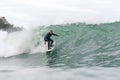 68 year old man surfing a big wave Royalty Free Stock Photo