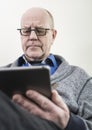 Older man on tablet pc Royalty Free Stock Photo