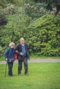 Older man walking with mother