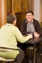 Older man and woman couple in kitchen Royalty Free Stock Photo