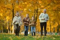 Older man and woman with grandchildren