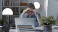 Man working with laptop at home office Royalty Free Stock Photo