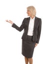 Older or mature isolated businesswoman presenting over white.