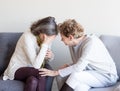 Older mother comforting middle aged daughter Royalty Free Stock Photo