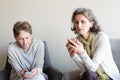 Older mother and daughter using smartphones Royalty Free Stock Photo