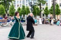 Older people spend their leisure time dancing in the square