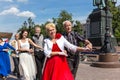 Older people spend their leisure time dancing in the square