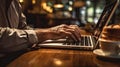 Older people use a laptop in a cafÃ©. Close-up of a man working on a laptop in a cafe. Generative AI.