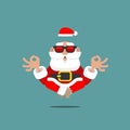 Older Santa Claus in meditation levitating in the air with sunglasses in a relaxing mental position of Yoga symbolizing a spiritua