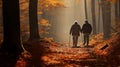 Older senior couple walking in autumn forest with walking aids and holding hands Royalty Free Stock Photo