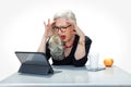 Older senior woman shocked with distress on computer because of online identity theft, financial problems, retirement issues, isol Royalty Free Stock Photo