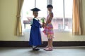 The older sister joins the sister in kindergarten clothes