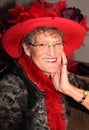 Older Smiling Red Hat Lady Royalty Free Stock Photo