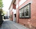Older style red brick apartment building exterior in Melbourne