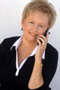 Older woman on cell phone Royalty Free Stock Photo