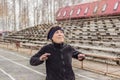 Older woman doing outdoor exercise.