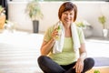 Older woman doing yoga indoors Royalty Free Stock Photo