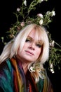 Older woman with laurel wreath and colorful shawl