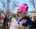 Older woman in pink hat at Womens March in Tulsa Oklahoma USA 1-20-2018