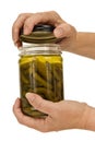 Older Woman's Hands Opening Glass Jar