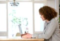 Older woman using laptop at home Royalty Free Stock Photo