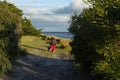 Older woman walking her dog