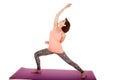 Older woman yoga lunge arm up Royalty Free Stock Photo