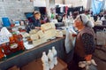 Older women buying homemade cheese on Georgian village market